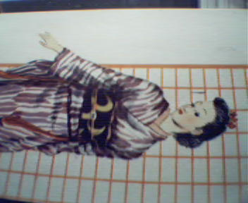 Yagasuri pattern Kimono being worn by Woman