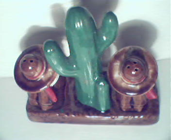 Two Little Mexican Men Sitting on Either Side of Cacti!