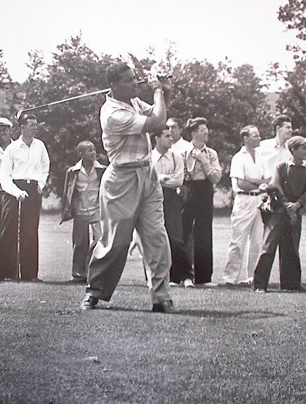 JOE LOUIS PLAYING GOLF. A TEENIE HARRIS