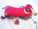 BRIO RED PULL DOG ON WHEELS         VERY NICE